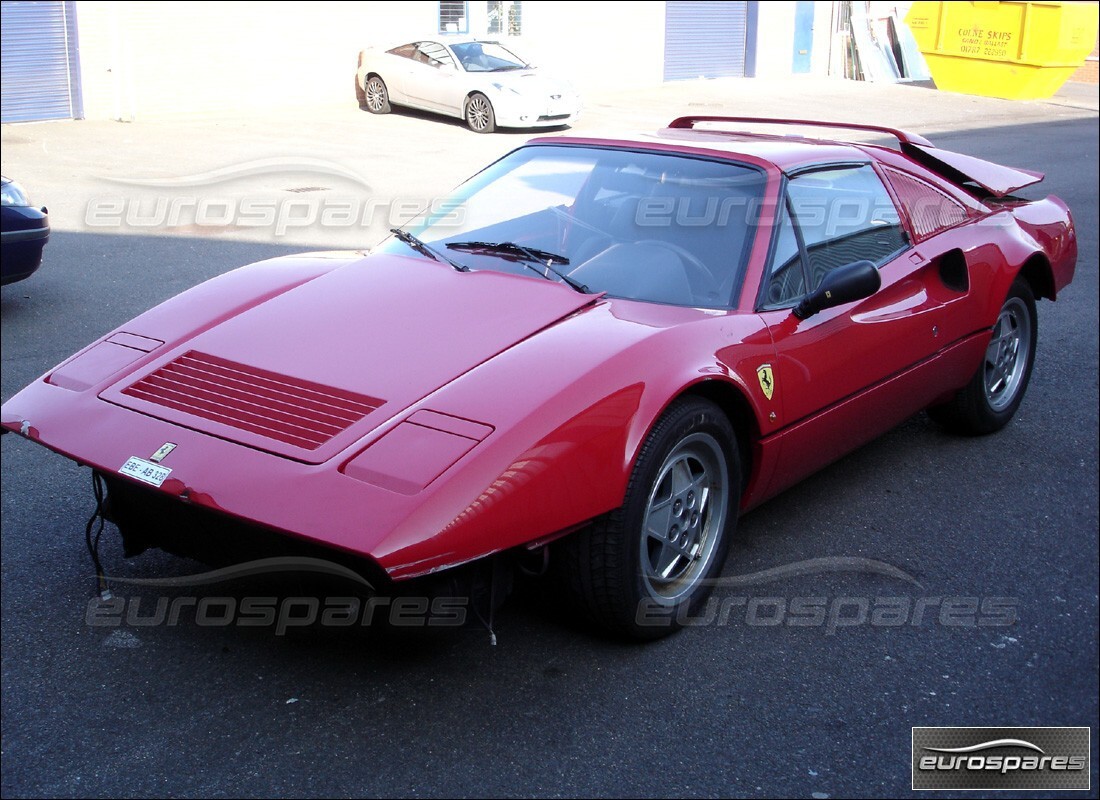 Ferrari 328 (1988) getting ready to be stripped for parts at Eurospares