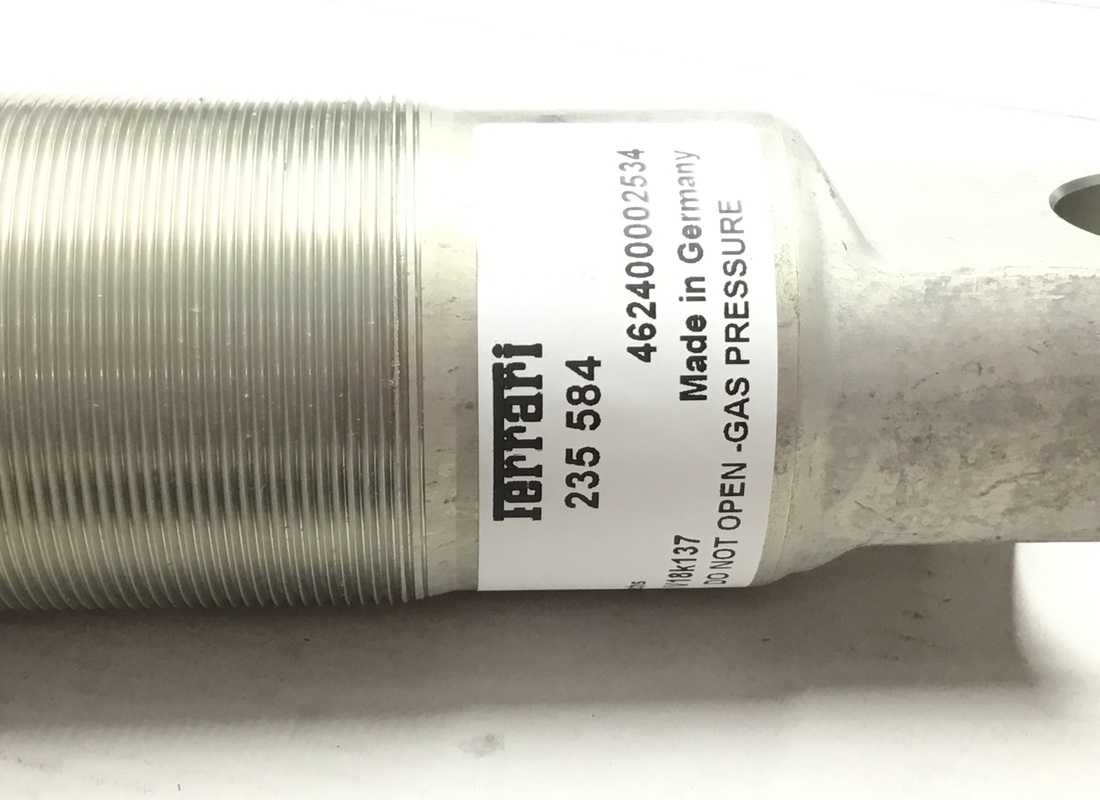 NEW FERRARI FRONT SHOCK ABSORBER. PART NUMBER 235584 (3) new ferrari front shock absorber. part number 235584 (3)