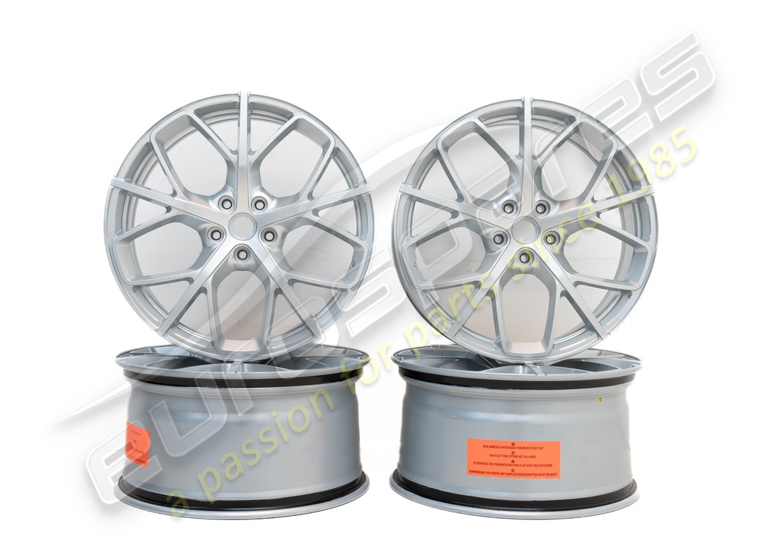 new ferrari genuine 20 forged wheels, paint finish, sparkling silver. part number 70004983 (1)