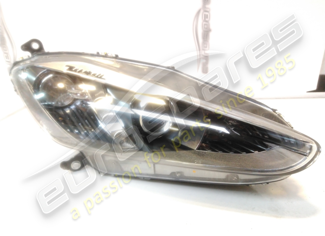 new maserati rh front headlight. part number 350565 (1)
