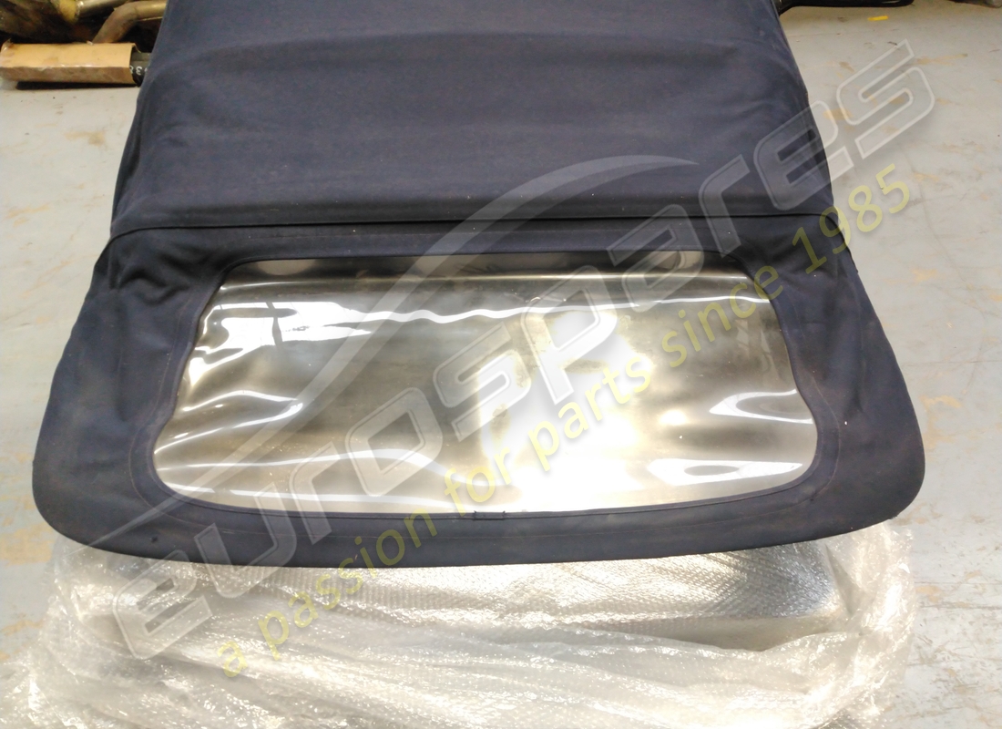 used maserati conv. top material blue. part number 67241004 (1)