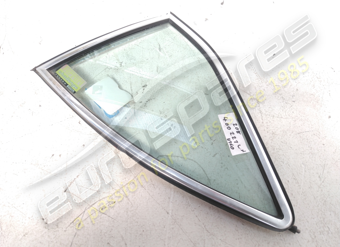new ferrari lh rear quarter light glass clear. part number 400227 (1)