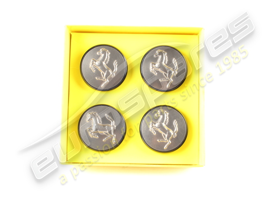 new (other) ferrari set 4 titanium push in hub caps part number 70001285