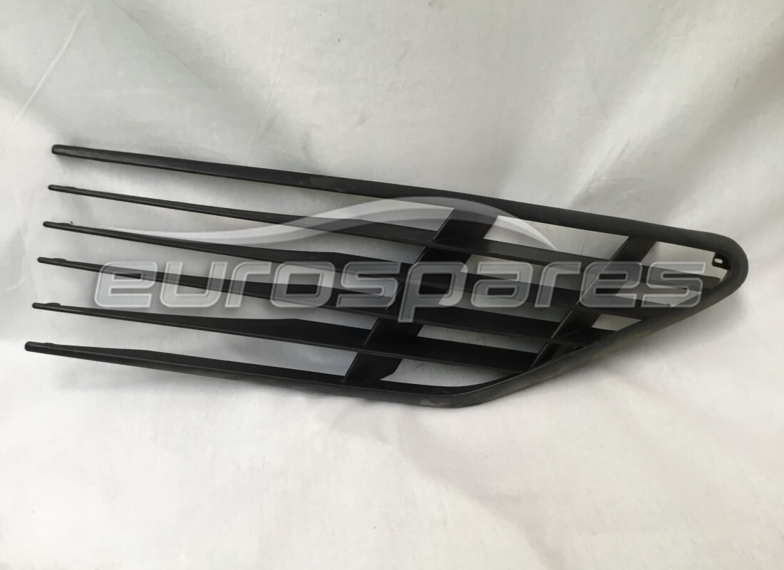 new ferrari lh side intake grille (plastic). part number 60671300 (1)