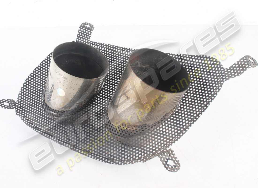 USED FERRARI RH EXHAUST TAILPIPE TIP. PART NUMBER 87787300 (3) used ferrari rh exhaust tailpipe tip. part number 87787300 (3)