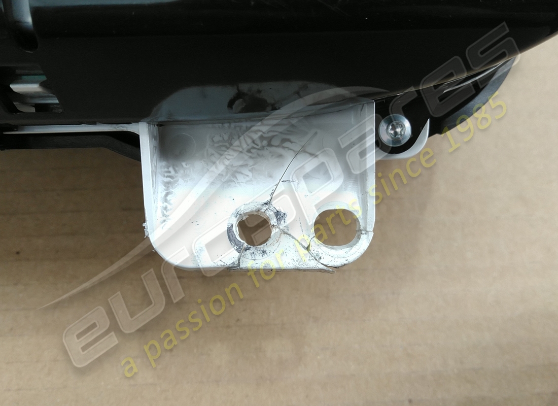damaged maserati maserati part 670100154. part number 670100154 (3)