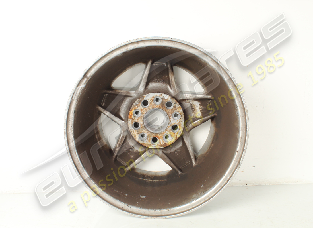 USED FERRARI ROAD WHEEL FRONT 3.2 MQV. PART NUMBER 127465 (6) used ferrari road wheel front 3.2 mqv. part number 127465 (6)
