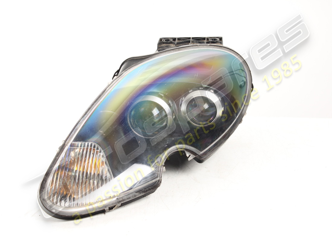 DAMAGED Aston Martin HEADLAMP ASSEMBLY, HID, LH, RHD . PART NUMBER 4G4313W030AD (1)