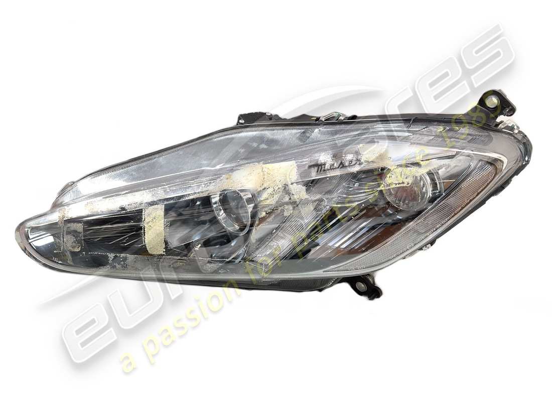used maserati lh front headlight. part number 350566 (1)