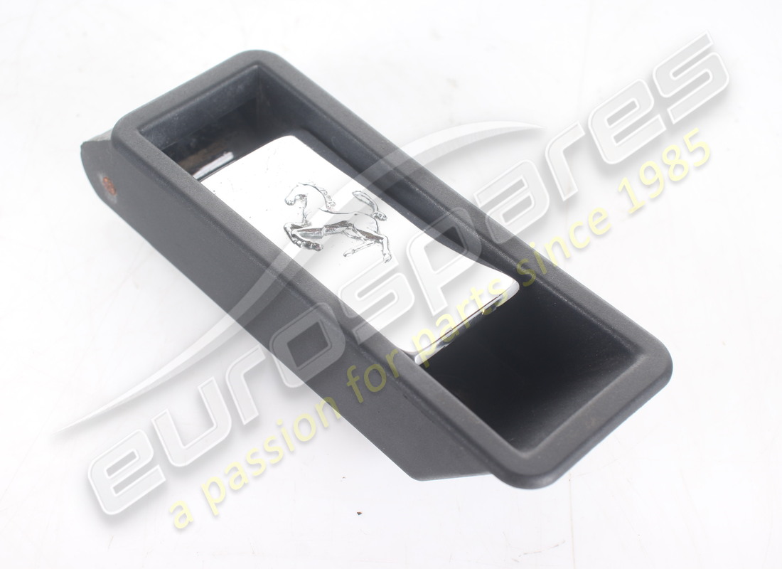 DAMAGED FERRARI INTERNAL BOOT RELEASE HANDLE (EMBOSSED HORSE MOTIF). PART NUMBER 63011800 (1) damaged ferrari internal boot release handle (embossed horse motif). part number 63011800 (1)