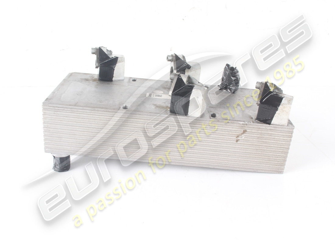 USED FERRARI OIL HEAT EXCHANGER. PART NUMBER 326420 (2) used ferrari oil heat exchanger. part number 326420 (2)