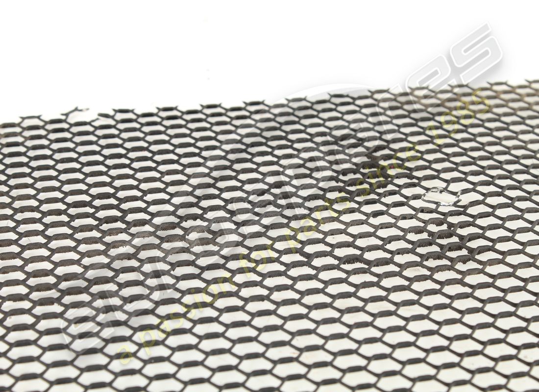 USED FERRARI ENGINE LID GRILLE MESH. PART NUMBER 60561100 (4) used ferrari engine lid grille mesh. part number 60561100 (4)