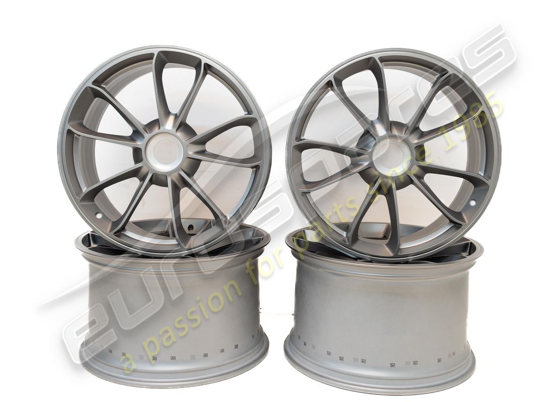 NEW PORSCHE 20-INCH GT3 SET OF WHEELS - IN PLATINUM (SATIN-GLOSS). PART NUMBER 99104460311 (1) new porsche 20-inch gt3 set of wheels - in platinum (satin-gloss). part number 99104460311 (1)