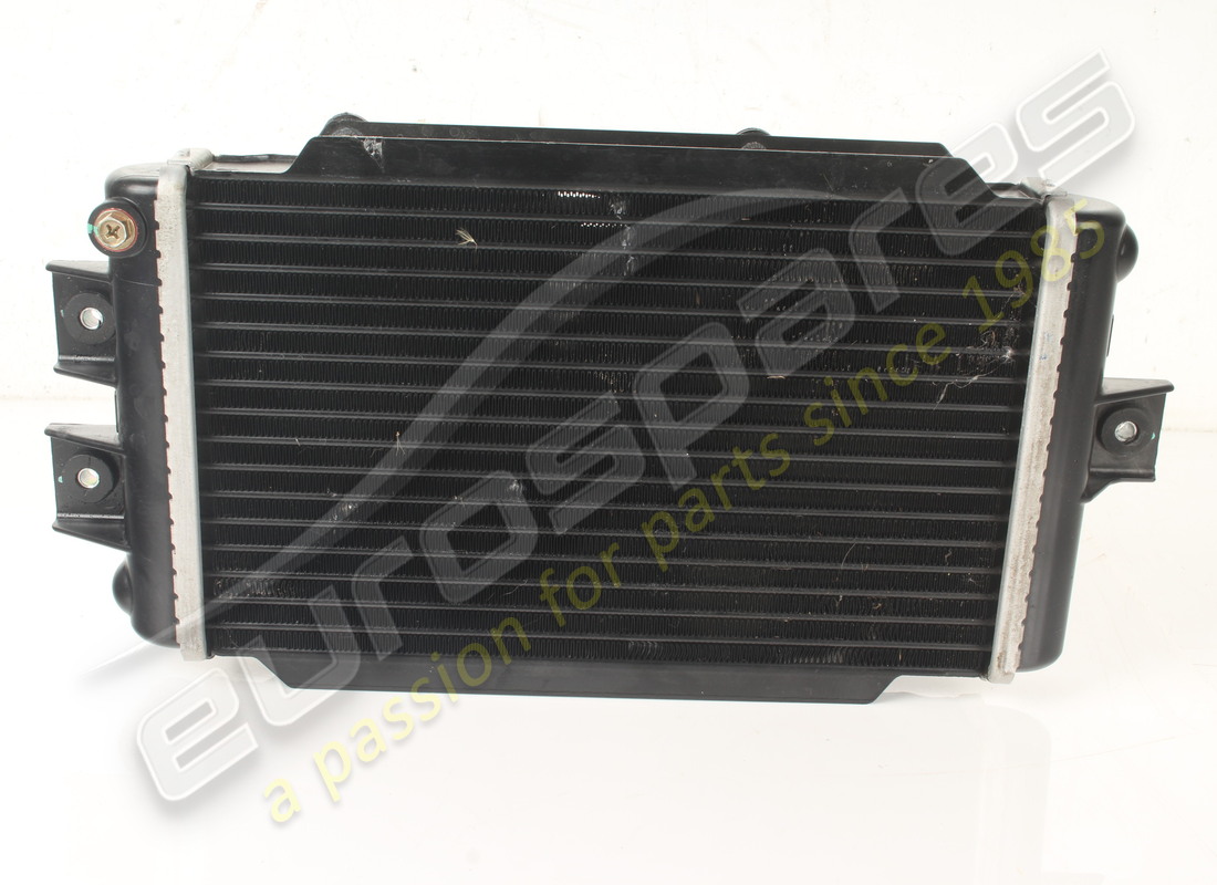 USED FERRARI RADIATOR WITH FAN. PART NUMBER 934069 (3) used ferrari radiator with fan. part number 934069 (3)