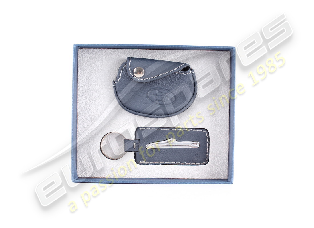 NEW MASERATI LEATHER KEY COVER AND KEYRIN. PART NUMBER 940000418 (3) new maserati leather key cover and keyrin. part number 940000418 (3)
