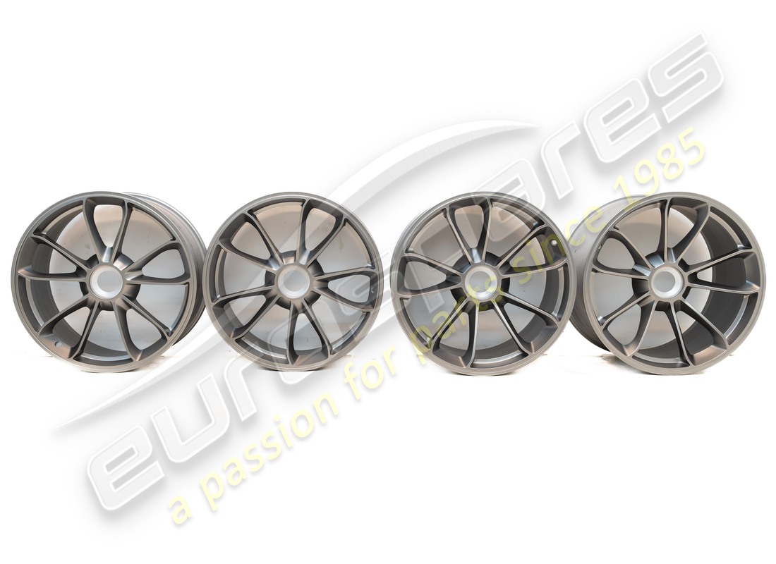 NEW PORSCHE 20-INCH GT3 SET OF WHEELS - IN PLATINUM (SATIN-GLOSS). PART NUMBER 99104460311 (2) new porsche 20-inch gt3 set of wheels - in platinum (satin-gloss). part number 99104460311 (2)