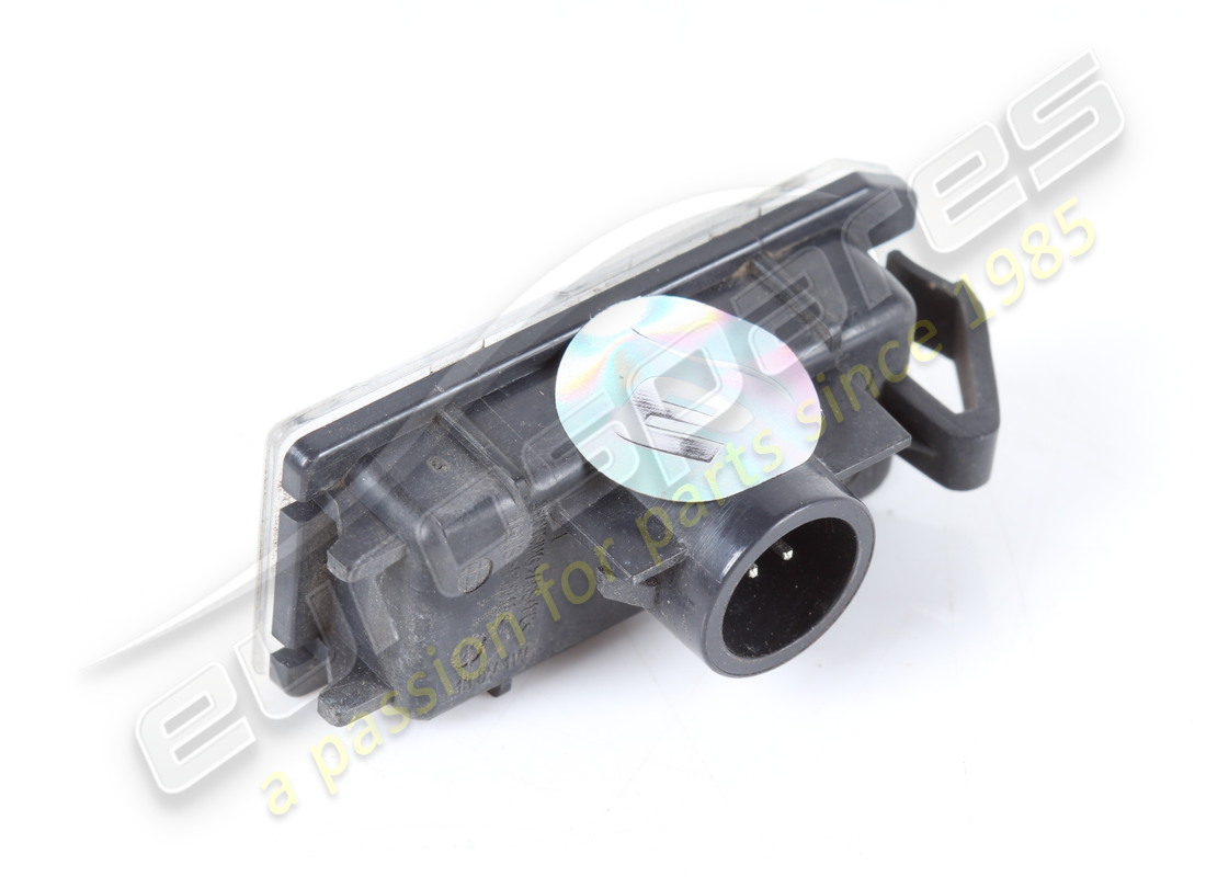USED FERRARI LICENSE PLATE LIGHT/PUDDLE LAMP. PART NUMBER 318015 (2) used ferrari license plate light/puddle lamp. part number 318015 (2)