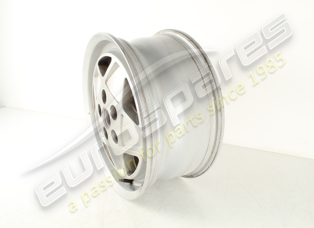 USED FERRARI ROAD WHEEL FRONT 3.2 MQV. PART NUMBER 127465 (2) used ferrari road wheel front 3.2 mqv. part number 127465 (2)