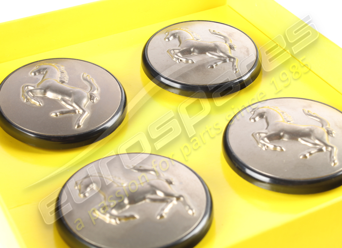 NEW (OTHER) FERRARI SET 4 TITANIUM PUSH IN HUB CAPS. PART NUMBER 70001285 (2) new (other) ferrari set 4 titanium push in hub caps. part number 70001285 (2)