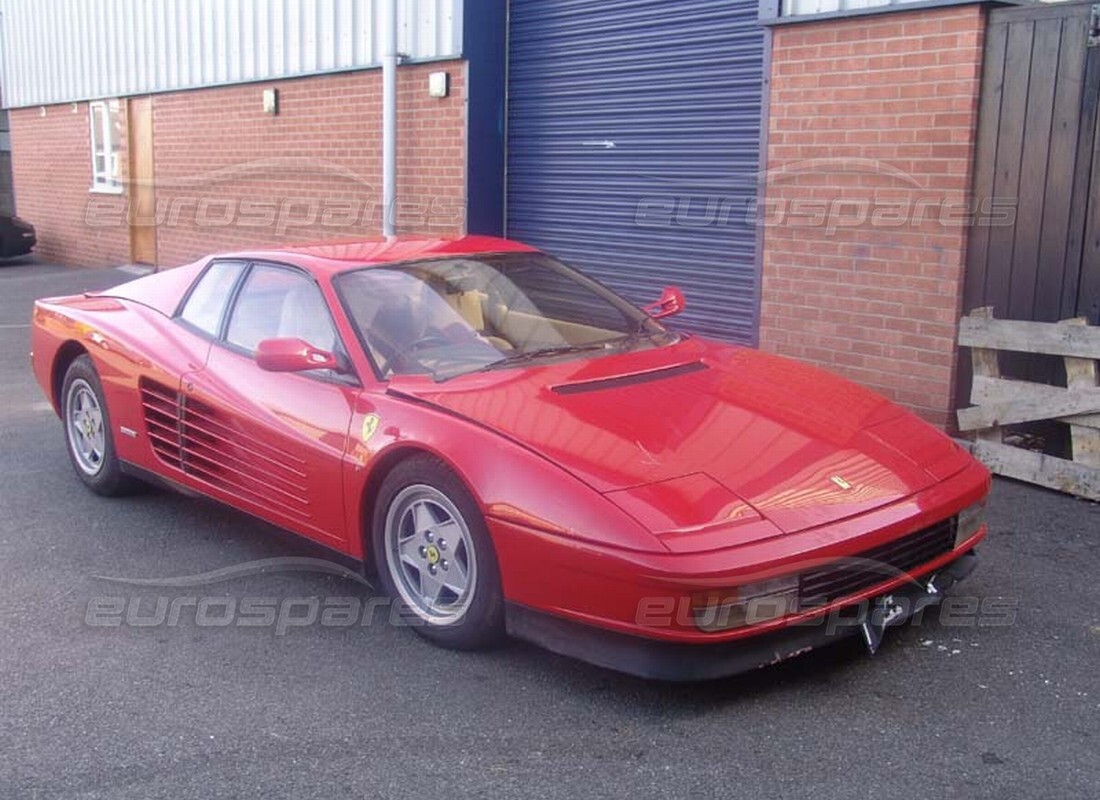 ferrari testarossa (1990) being prepared for dismantling at eurospares